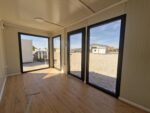 Conteneur Aménagé 18 m² Isolé et Vitré avec Salle de Bain